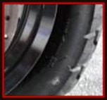 Sidewall of motorcycle tire to be scrubbed by Fifty Dollar Detail.